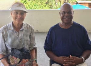 Linda Sorensen and Mahlon “Koko” Pickering share waiting space between appointments for SBA counselors at the Disaster Recovery Center in Cruz Bay. Pickering called the SBA loan application process 'very professional.'