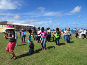 The rally concluded – as so many events do in the territory – with participants dancing to 'The Electric Slide.'