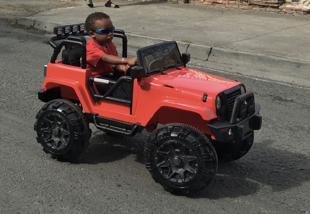 The youngest driver in the parade shows of his jeep. (Ivy Hunter photo)