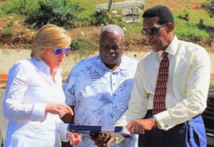 From left: HUD Deputy Secretary Pamela Hughes Patenaude, Gov. Kenneth E. Mapp and V.I. Housing Authority Executive Director Robert Graham, review plans for the demolition of Tutu High Rise.