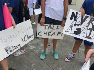Student protest signs included some trenchant comments aimed at politicians.