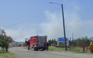 A fire truck blocks the entrance to the Anguilla Landfill. (Susan Ellis photo)