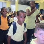 Students file off to class after morning assembly