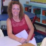 Zhyiare Penn, 6, teacher Tracey Maish and Ne’Kyle Alfredo, 6