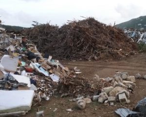 Storm debris collected in Coral Bay ball field on St. John.