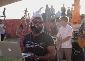 Fish fry organizer Kemit-Amon Lewis talks to the crowd.