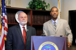 BMV Director Lawrence Olive and Attorney General Claude Walker.