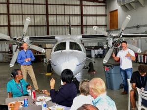 Home on St Croix after CaribAvia, Billy Bohlke and Dr. Brendan Anzalone express gratitude to the home team at a company luncheon. (Photo by Ashley Bouzianis, provided by Bohlke International Airways)