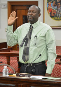 V.I. Carnival Committee Executive Director Halvor Hart stands to testify under oath. (V.I. Legislature photo)