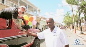 St. Croix Police Chief Winsbut McFarlane, who oversaw the police presence at Saturday's parade, greets a participant. (Photo provided by Johanna Bermùdez-Ruiz and Cane Bay Films) 