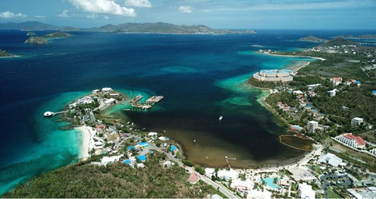 Sargassum is breaking down near Coki Point, seen above, and Margaritaville, and creating a serious smell. (Photo by Alain M. Brin, Blue Glass Photography)