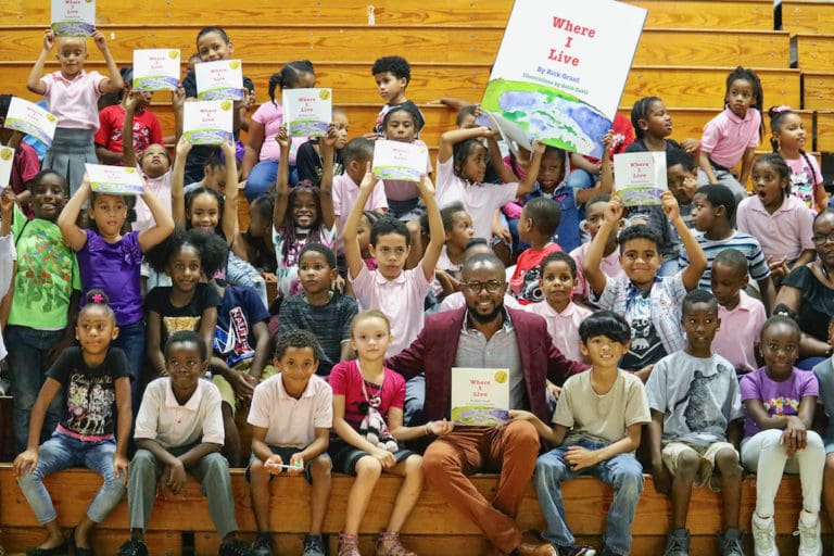 Students join author Rick Grant at Saturday's rally kicking off the 10th Governor's Summer Reading Challenge.
