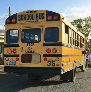 A school bus picks up students. (File photo)