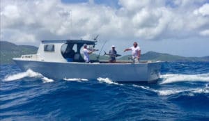 Anglers aboard Feel Good show off their catch.