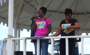 Ophelia 'Nemmy' Jackson addresses the St. Croix Women's March in January. Beside her is Carol Burke. (Anne Salafia photo) 