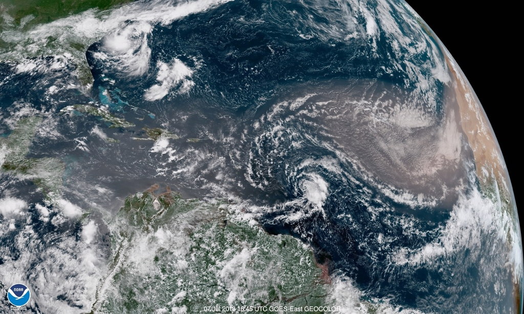 Saturday morning NOAA satellite photo shows Beryl, now a tropical storm, moving towards the Lesser Antilles. 