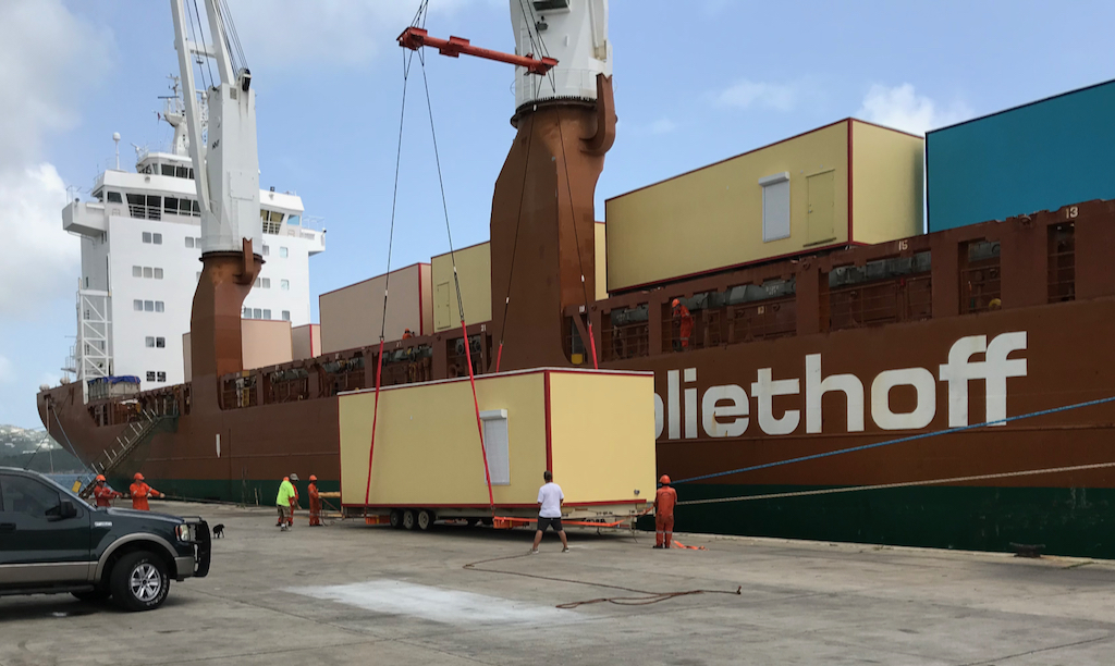 The first 80 modular units for the USVI schools arrive at St. Thomas Sunday. (Department of Education photo)