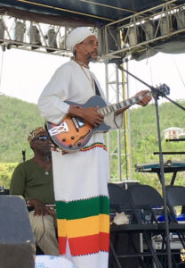 Haile Israel performs for the St. John audience.
