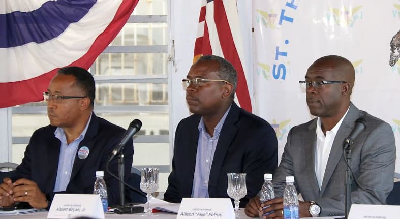 From left, Angel Dawson, Jr., Albert Bryan, Jr. and Allison “Allie” Petrus take a unified stance in hopes of “bringing about a better future” for the territory.