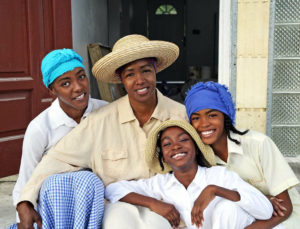 In 2006, Michelle Greene, center, and her daughters, from left, Amaris, Afiya and Asha, posed in a scene depicting Maroon culture. (Ted Davis photo)