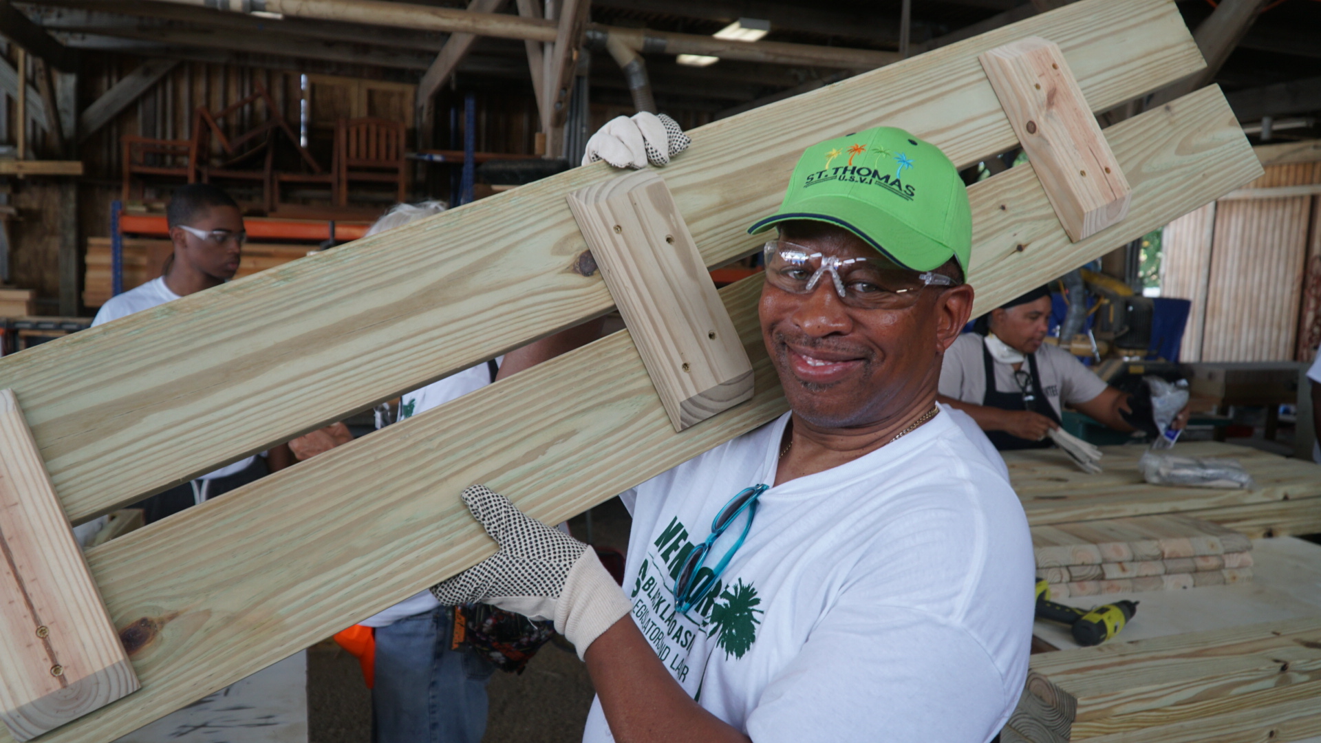 NYC Councilman Andy King helps My Brother’s Workshop build tables for schools.
