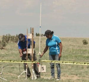 Steve and Subhasanie Bullock prepare their gold medal winning rocket for flight. (Photo from Steve Bullock's Facebook page)