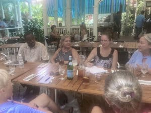 Clockwise from upper left, Mapp policy advisor Frankie Johnson, guest Linda Sucholoeb, Kristin Cox of St. John Ultimate Villas, and Terry Witham of Francis Bay Homes, Jackie Harrison of Vacation Vistas and BJ Harris of St. John Properties, discuss St. John tourism issues.