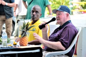 USDA Secretary George Perdue, right, speaks to V.I. farmers at a town hall meeting Wednesday as VI Agriculture Commissioner Carlos Robles looks on.