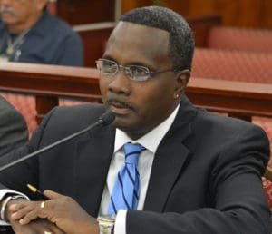 WICO Executive Director Clifford Graham testifies before the Senate Finance Committee. (V.I. Legislature photo by Barry Leerdam)