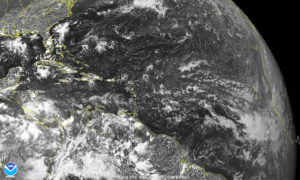 Monday morning satellite photo of the Atlantic shows a tropical wave departing the African coast. (GOES-East satellite photo, NOAA)
