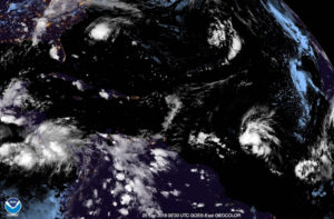 This 8:30 p.m. AST Monday satellite photo, with the USVI and Puerto Rico just to the left of center, shows the remnant of TS Kirk at right, moving west towards the Windward Islands at about 25 mph. (NOAA photo)