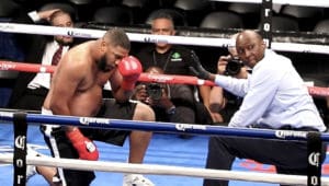 Sherman Artis, Jr. catches his breath after being dropped for the second time by V.I. heavyweight Clayton Laurent, Jr.