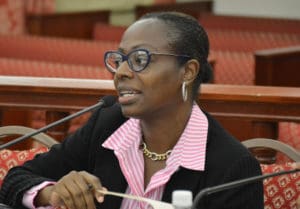 Banking and Insurance Division attorney Dolace McLean answers a question during Tuesday's hearing. (Photo by Barry Leerdam for the V.I. Legislature)