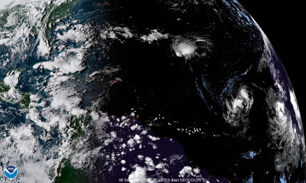 In this satellite photo taken at 6 p.m. AST, three storm systems, Florence, Issac and Helene are developing and moving west. (NOAA satellite photo.