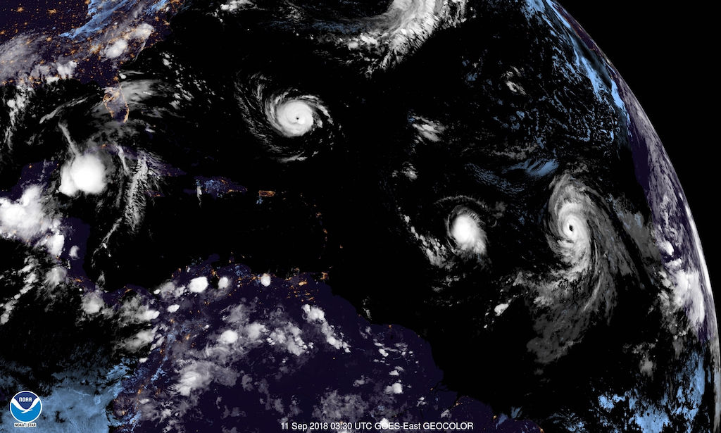 Satellite photo from 11:30 p.m. Monday shows Hurricane Florence north of Puerto Rico and the Antilles (outlined in red,) with Tropical Storm Issac to the right, and Hurricane Helene following it to the far right. (NOAA photo)