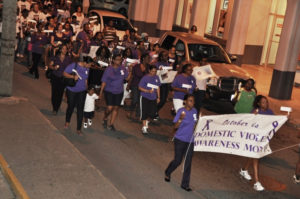 Led by a vanguard in purple, more than 200 people marched through Christiansted in the Women's Coalition's 2011 Take Back the Night March. (File photo)