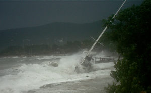 A boat is driven ashore by the winds of Hurricane Earl in 2010. Extreme weather may come more frequently but less predictably to the territory under worst-case predictions in the National Climate Assessment. (File photo)