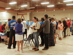 Voters line up for their chance to cast a ballot at the Lockhart polling site. (April Rose Knight photo) 
