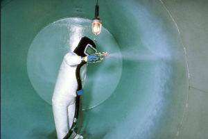 Example of a technician applying non-corrosive lining on the inside of an underground storage tank (Photo  by EPA)