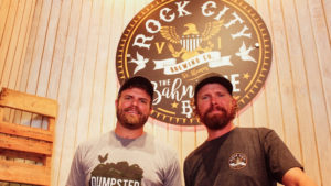 Rock City Brewing owners Joe, left, and John Brugos currently sell Hull Bay Lager at “The Beer Barn,” pictured here, and Tap & Still.