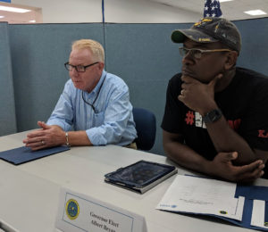 Governor-elect Albert Bryan Jr. receives a briefing on the hurricane recovery effort at the FEMA Joint Field Office in St. Croix on Dec. 8. (Photo from the office of Governor-elect Albert Bryan)