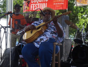 Wayne "Bully" Petersen of Bully and the Kafoonaz lures fans at the 11th annual Coquito Festival. (Anne Salafia photo)