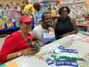 At the book signing event at Undercover Books & Gifts, from left, poet Winifred 'Oyoko' Loving, chef Mark E. Davis, and artist and writer Danica David. (Anne Salafia photo)