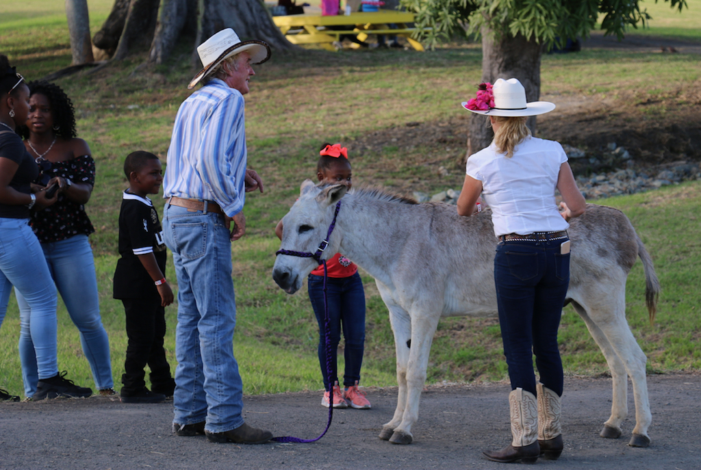 Cowboy Stephen O’Dea and Eeyore the donkey gave rides to happy young fairgoers. (Linda Morland photo)