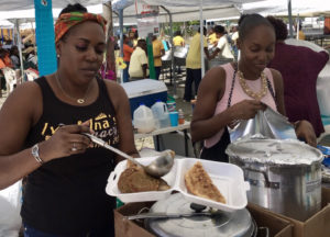 At the 2019 Folklife Festival, twins Luciah Polius and Loreli Hedrington serve up food as their grandmother and great aunt did for 20 years. (Source file photo)