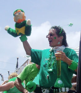 A leprechaun is waved to the Christiansted crowd during the 2008 St. Patrick's Day Parade. (File photo)