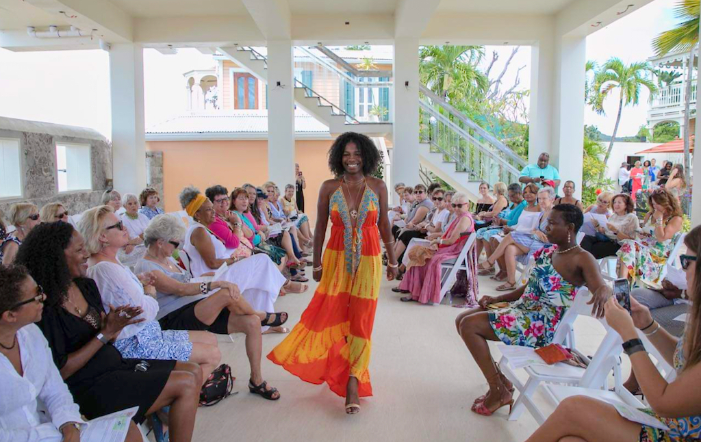 Model Jai Issa, wearing a design from Envii Boutique, walks the runway at the third Crucian Fashion Fest Sunday in Frederiksted. (Photo by Kelly Greer Culp)