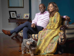 Gov. Albert Bryan and first lady Yolanda Bryan with Kobe, the family’s miniature schnauzer, at Government House on St. Croix. (Government House photo)