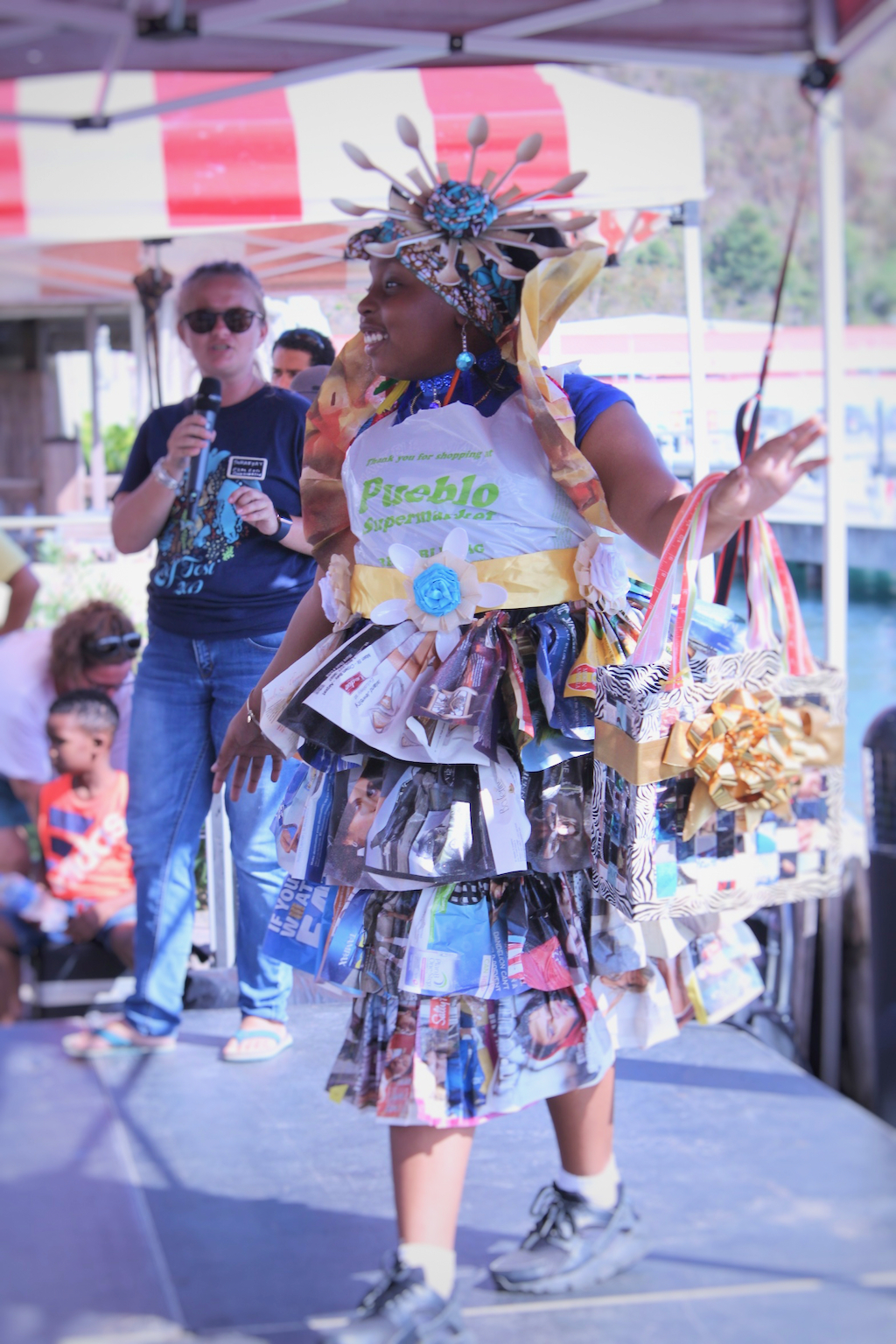 Wearing a ruffled dress made of magazines, newspapers and grocery bags, Kelyssa Kelley, graced the stage of the Trashion Show with a smile and panache. The 9-year-old represented Lockhart Elementary School and completed her outfit with a handbag and full head piece made from recycled materials.