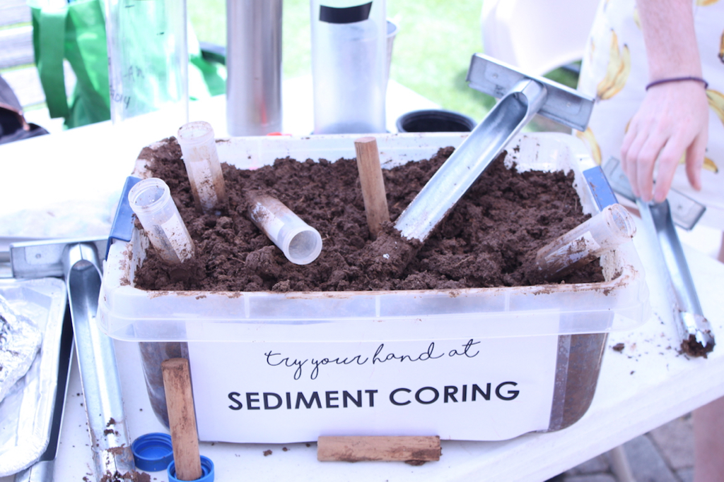 One booth for guests to interact with displayed a bin full of sand to sift through with a sign that asked if attendees know what lives on sandy beaches, while another prompted guests to try sediment coring using metal tubes. On display were data results from the 2016 Territory Beach Cleanups and the 2018 Great Mangrove Cleanup, which concluded metal bottle caps and plastic pieces to be the most frequent debris collected. 